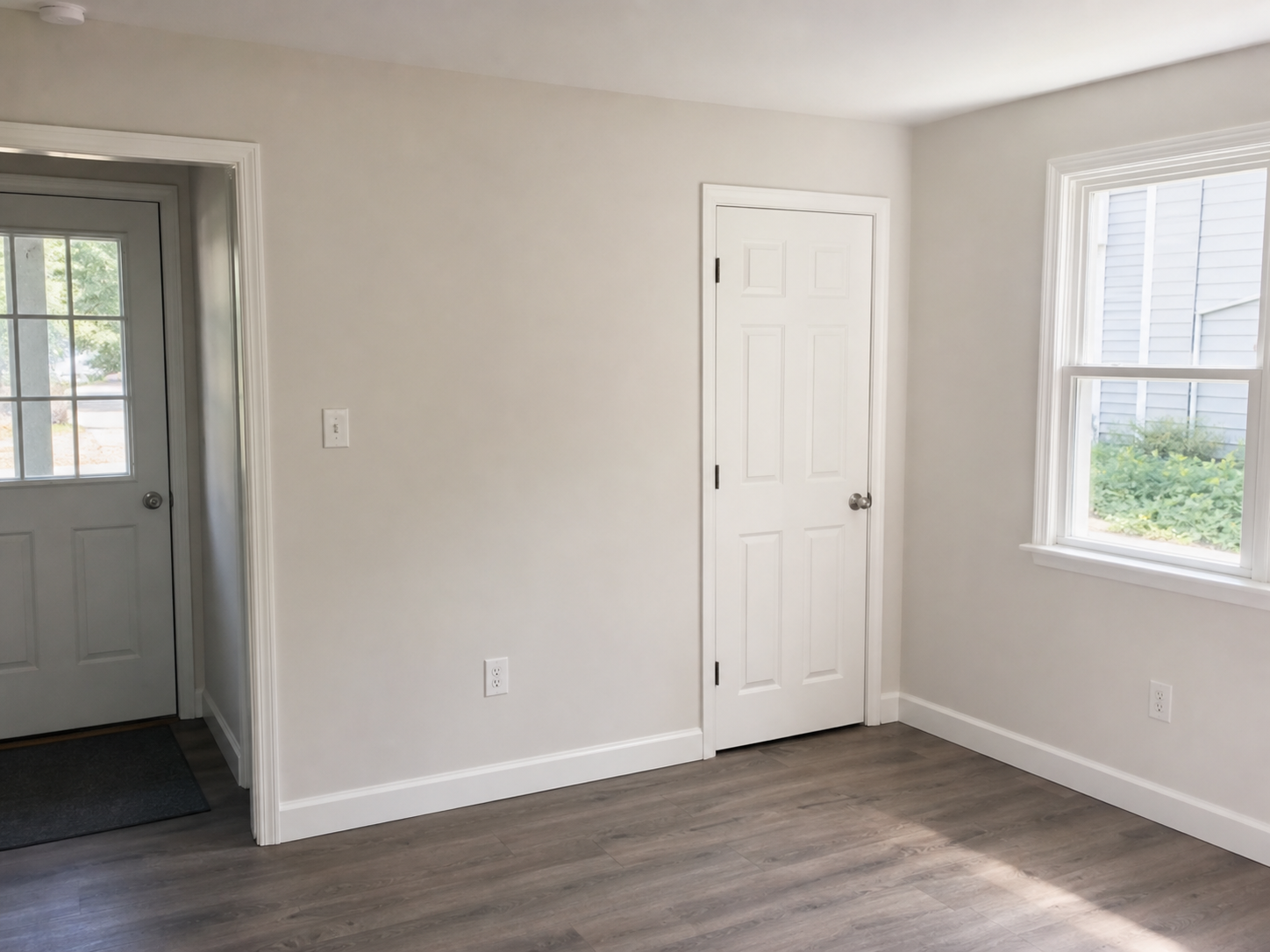 Clean rental turnover area after wall, trim, and fixture touch-ups